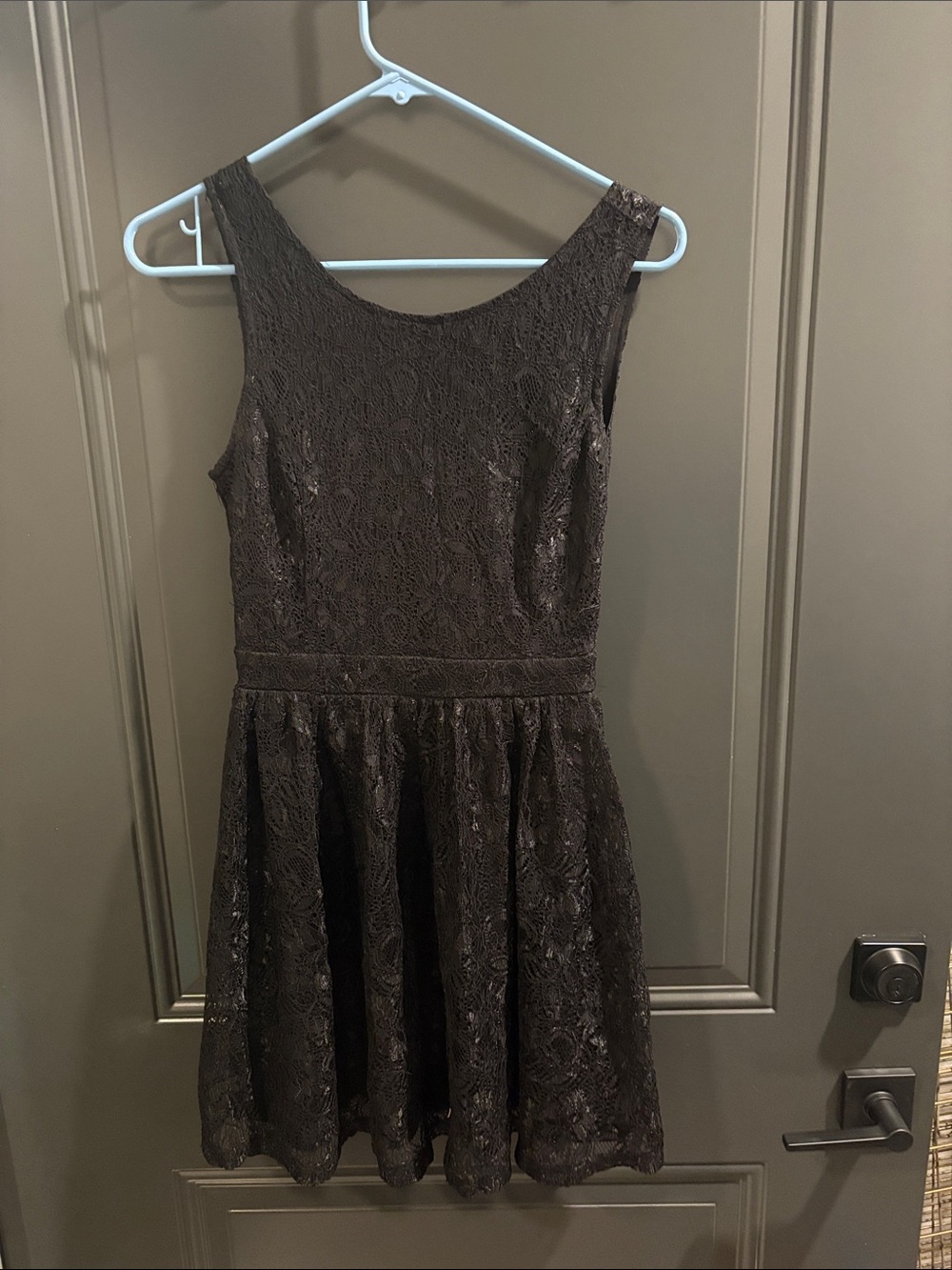 Forever 21 Black Lace Sleeveless Mini Dress with partially open back.